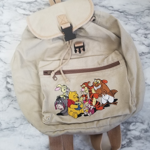 Disney Handbags - Disney winnie the pooh small backpack bag